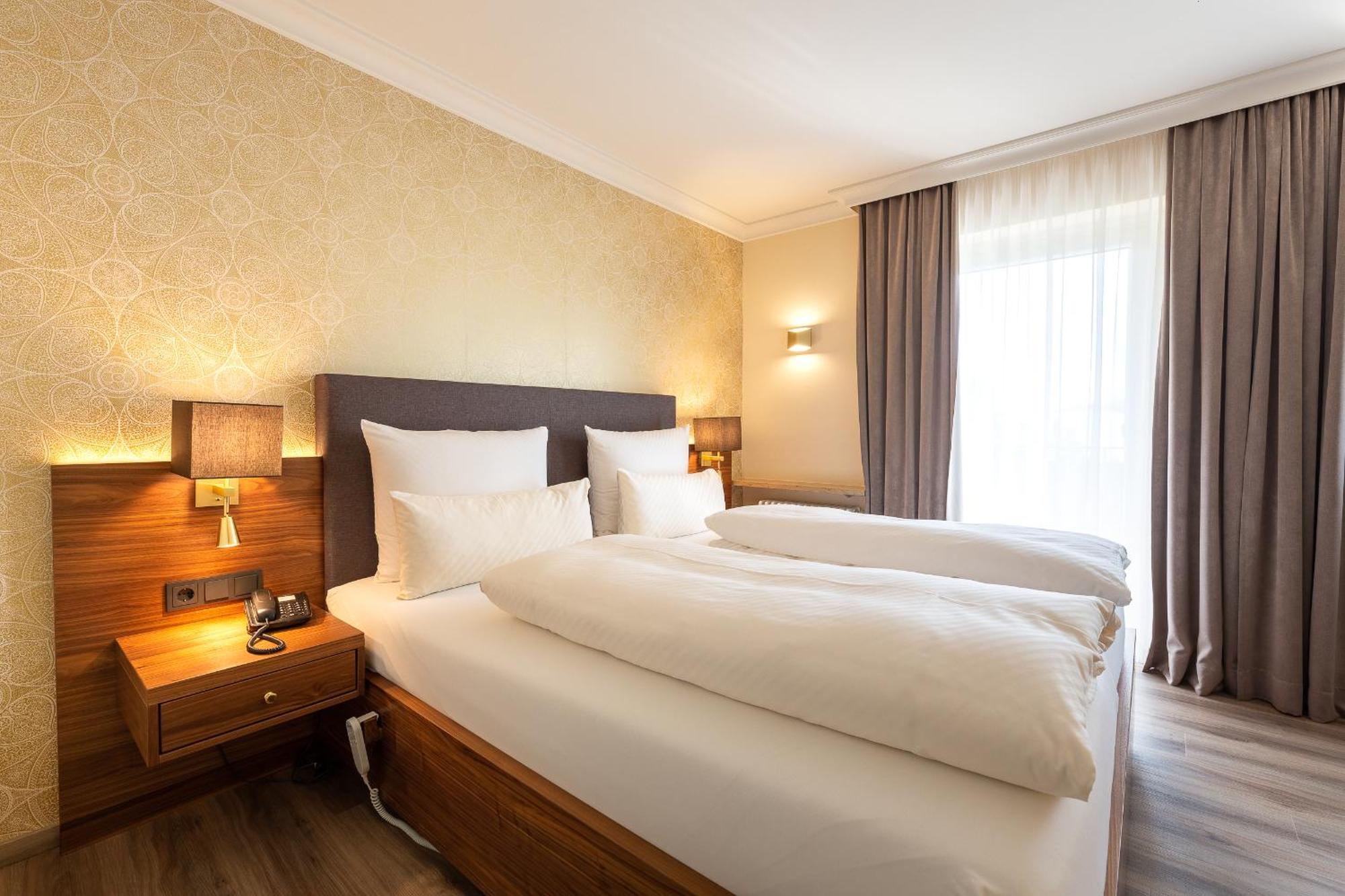Holzapfel Hotel Bad Fussing Bagian luar foto